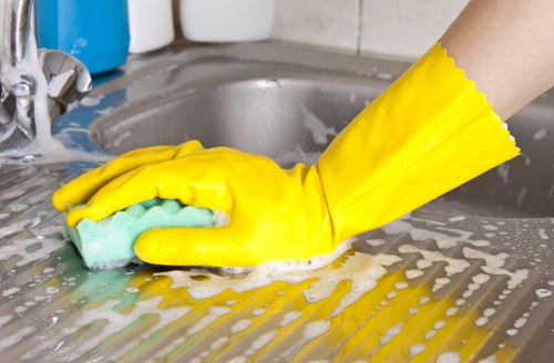Cleaner reviewing service notes and liability details on-site
