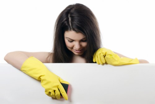 Technician applying steam carpet cleaning to a carpeted room in Putney